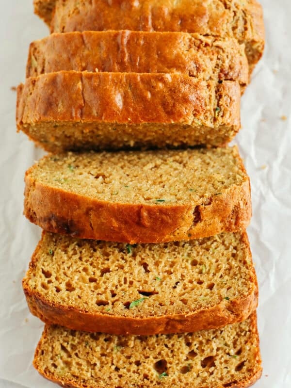 This Healthy Zucchini Bread is moist, fluffy, and made healthier with whole wheat flour, Greek yogurt, shredded zucchini and zero butter or refined sugar.  Perfect for breakfast or an easy snack!
