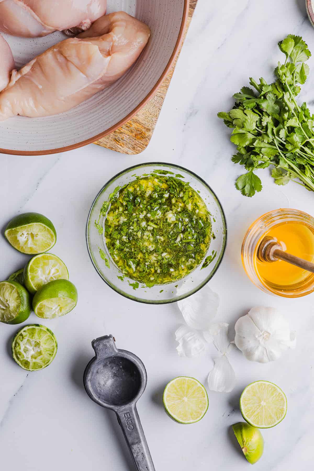 This Cilantro Lime Grilled Chicken Recipe is packed with so much zesty flavor and easily made with just a few simple ingredients! A delicious, healthy meal you can serve in tacos, on salads or over rice.