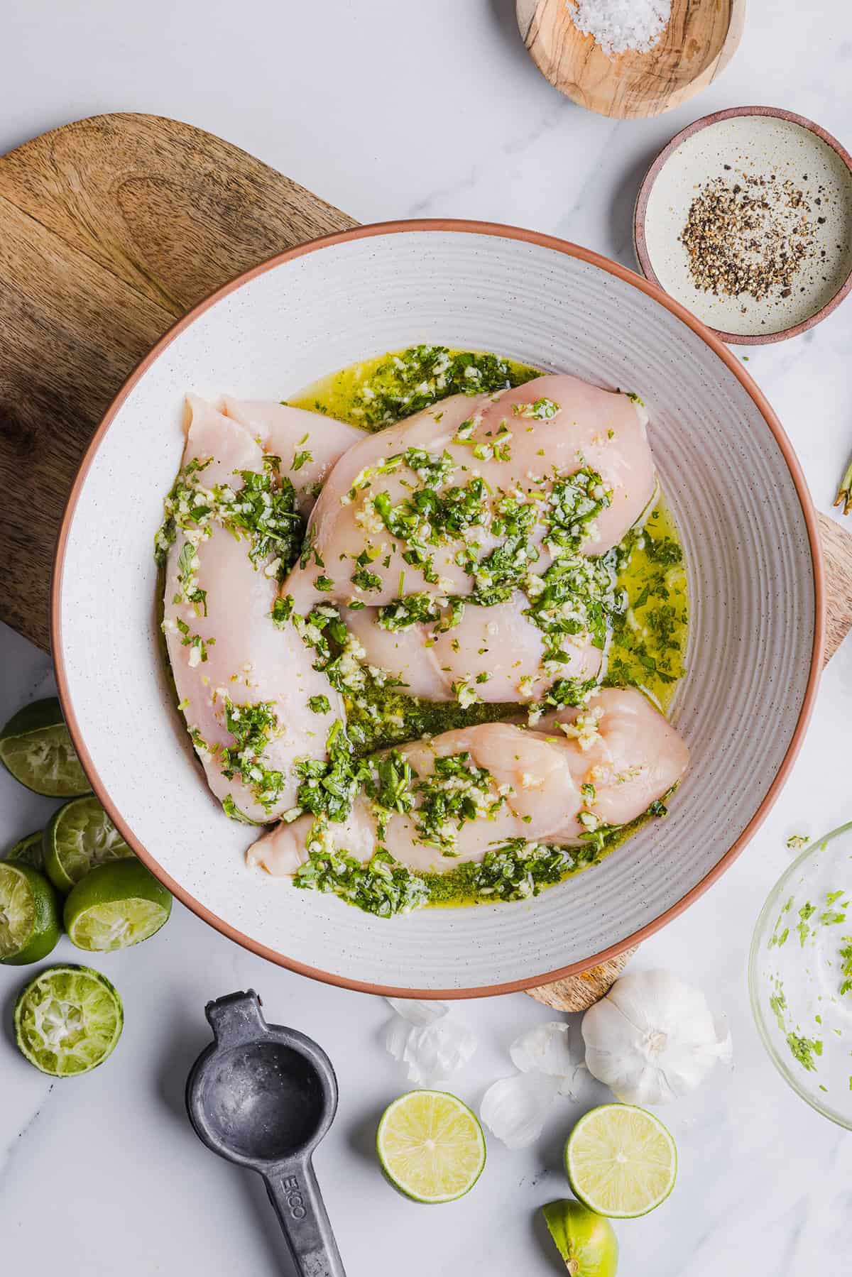 This Cilantro Lime Grilled Chicken Recipe is packed with so much zesty flavor and easily made with just a few simple ingredients! A delicious, healthy meal you can serve in tacos, on salads or over rice.