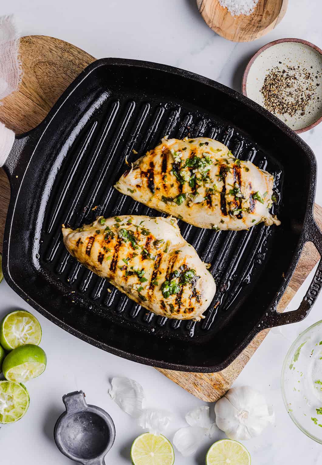 This Cilantro Lime Grilled Chicken Recipe is packed with so much zesty flavor and easily made with just a few simple ingredients! A delicious, healthy meal you can serve in tacos, on salads or over rice.