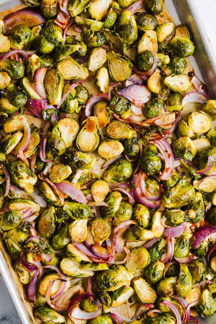 These Balsamic Roasted Brussels Sprouts make the perfect side dish that is so flavorful and easily made in under 30 minutes!  The honey balsamic glaze is simply incredible!