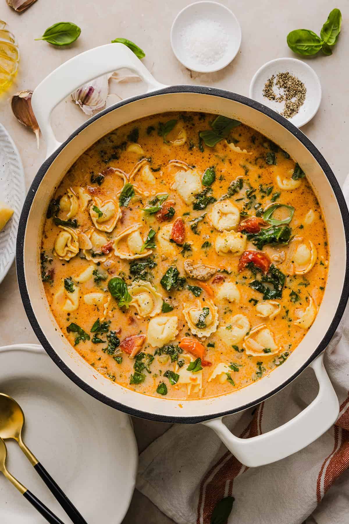 This Creamy Tortellini Soup is cozy, comforting and made with tender cheese tortellini, fresh veggies, herbs and a rich creamy broth. The perfect one pot meal that is both flavorful and satisfying!