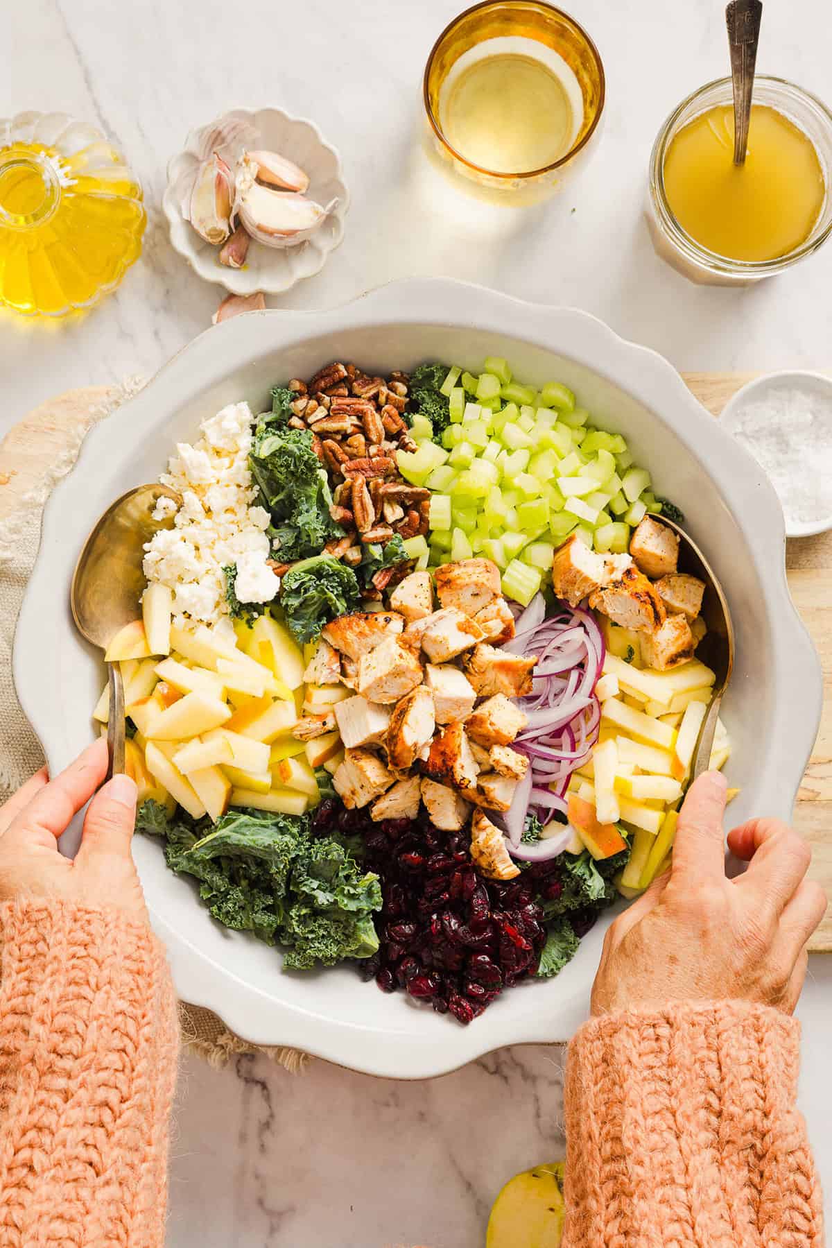 This fresh and flavorful Harvest Chopped Chicken Salad is made with leafy kale, tender juicy chicken, chopped apples and crunchy pecans all tossed with a maple dijon dressing! This salad is hearty enough for dinner and light enough for lunch!