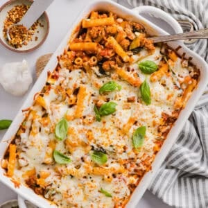 Comforting and delicious Healthy Baked Ziti packed with veggies, flavorful turkey sausage and makes the perfect weeknight meal the whole family will love! Leftovers guaranteed!